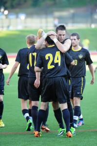 Photo of soccer team celebrating