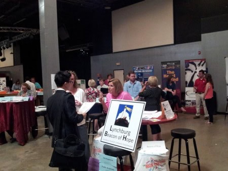 A Randolph student talks to a nonprofit representative about internship opportunities during the 2013 Internship Match-Up.