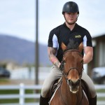 Michael Ramsey, a Navy veteran and member of the equestrian team at Randolph College, rides Koen during a training session at the Randolph College Riding Center. Michael Ramsey, a Navy veteran and member of the equestrian team at Randolph College, rides Koen during a training session at the Randolph College Riding Center.