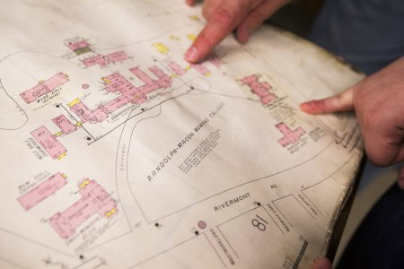 Strickler and Sherayko point to locations on an early campus map of Randolph-Macon Woman's College.