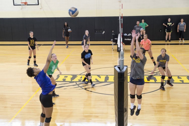 High School volleyball players participate in Randolph's Overnight Advanced Skills Camp.