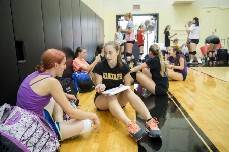 Emmy Roberts '18 spends time with high school volleyball players at the camp.