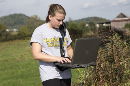 Sara Woodward '16 uses the GPR system to track differing soil depths at the site.