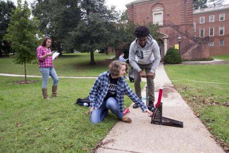 Randolph science students launch rockets on front campus.