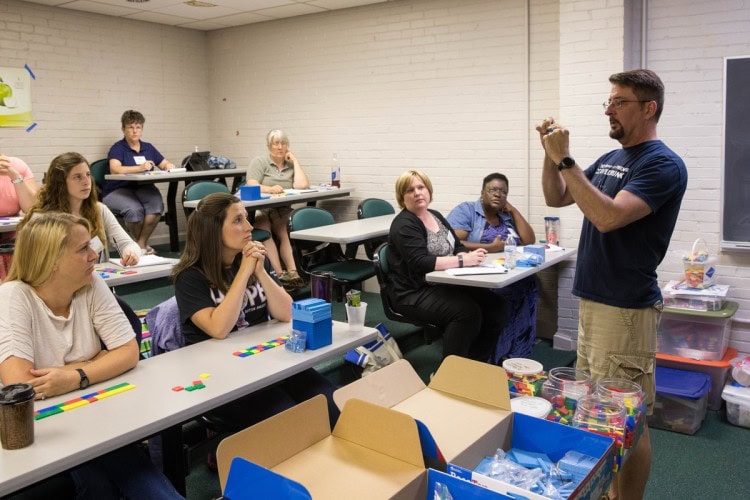 Adjunct education professor William Eggl demonstrates new techniques for teaching algebra.