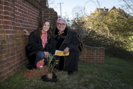 Erin McClelland '17 and President Bateman plant a rose on front campus, as is custom for the Founders' Day tradition.