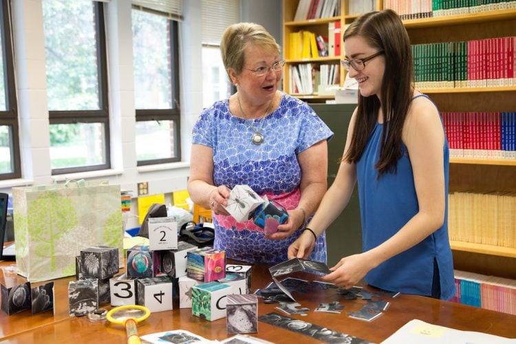 Education professor Cheryl Lindeman and Jasmine Fowler '20 craft more blocks for their "Curiosity Kit."