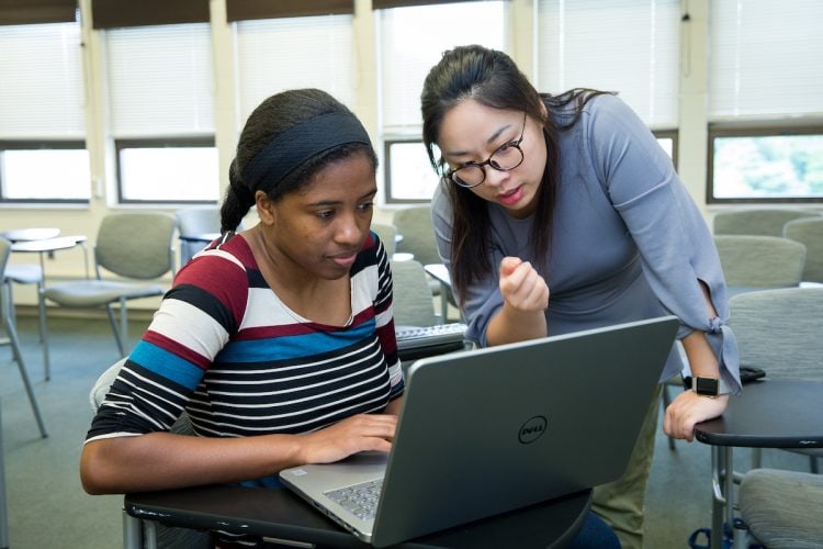 Taylor Samuels '18 and mathematics professor Jia Wan