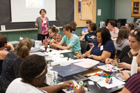 Education professor Peggy Schimmoeller leads a session during the teaching institute.