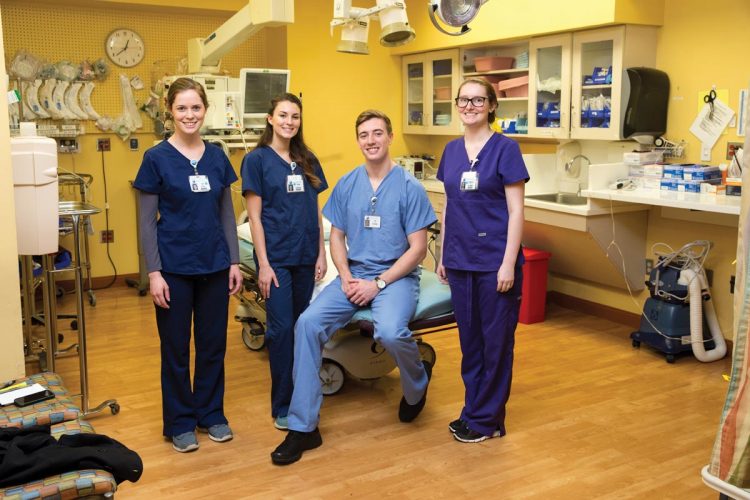 (From left) Sara Reed '15, Dani Hill '17, Joseph Uzdavinis '17, and Jessica Sidebottom '17