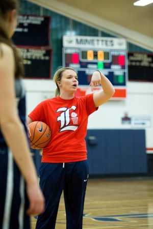 Emilee Dunton '14, '15 M.A.T. rallies her players during practice.