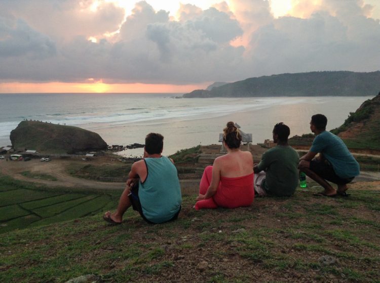 Keenan Hickman '14 and friends admire an Indonesian sunset.