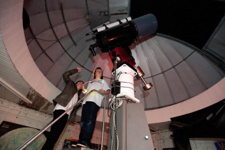 Students use the telescope in the Winfree Observatory during a recent Star Party.