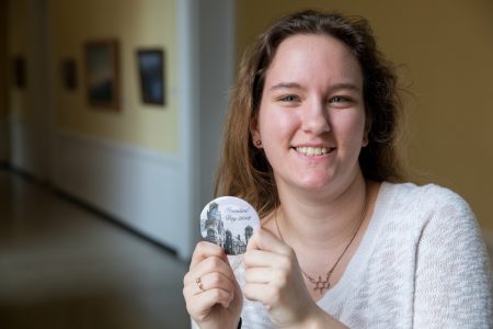 Emily Vaughn '20 designed the buttons that students will wear for Founders' Day 2018