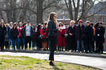 Alex Wieczorek '19 delivers her remarks to the crowd in front of Main Hall