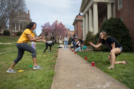 Students participate in an outdoor activity for a sport & exercise studies class