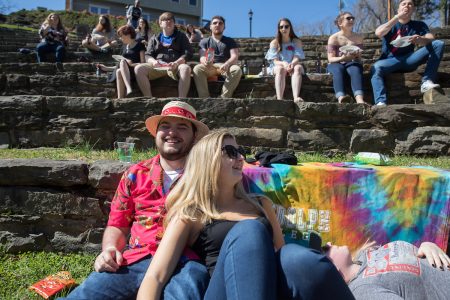 Students hang out on the stairs in the Dell for Dellfest