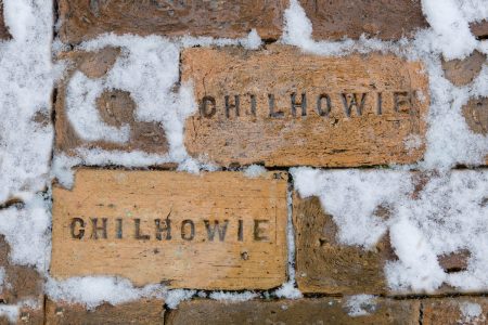 Bricks with the word "Chilhowie" on them, surrounded by snow