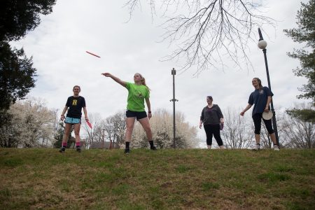 Sport & exercise studies students playing a game of frisbee golf