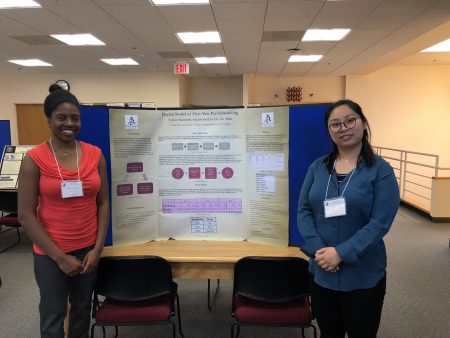 Taylor Samuels '18 (left) and mathematics professor Jia Wan 