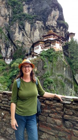 Professor Suzanne Bessenger in front of Tiger’s Nest Monastery in Paro, Bhutan