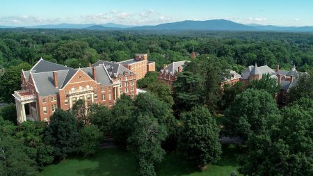 Aerial photo of campus, with the mountains in the background