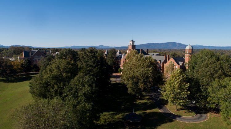 Aerial photo of campus with the blue sky and mountains in the background Aerial photo of campus with the blue sky and mountains in the background