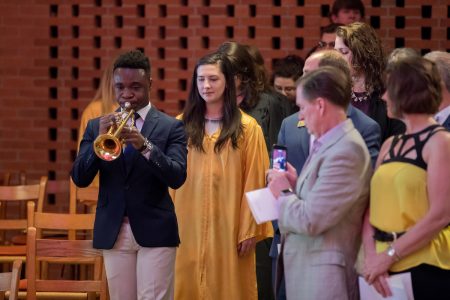 George Darko-Boateng '20 performs on trumpet at the 2018 baccalaureate service