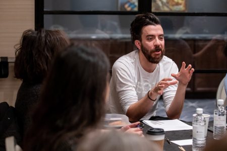 M.F.A. faculty member Kaveh Akbar leads a workshop for poetry students during their winter residency.