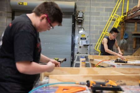 Dakota Willard (left) and Chris Perez worked as carpentry apprentices for the production