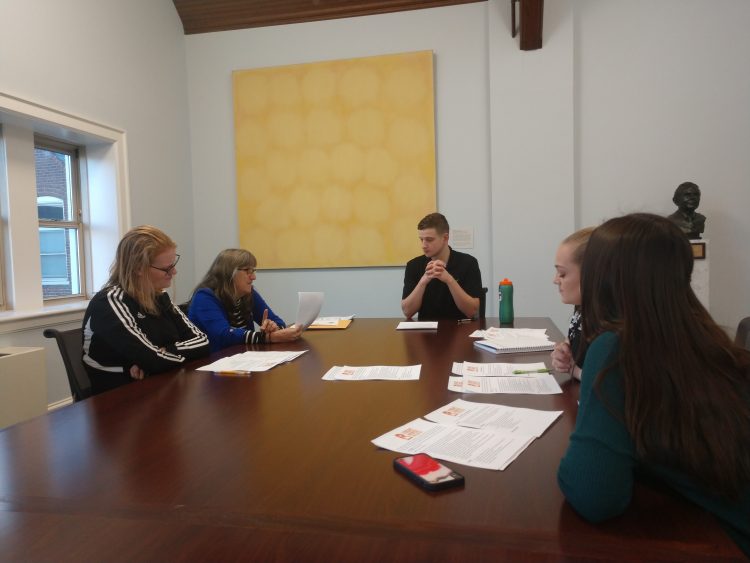 Students in Equine Studies 101 discuss ethical issues during a panel discussion in the Quillian Conference Room