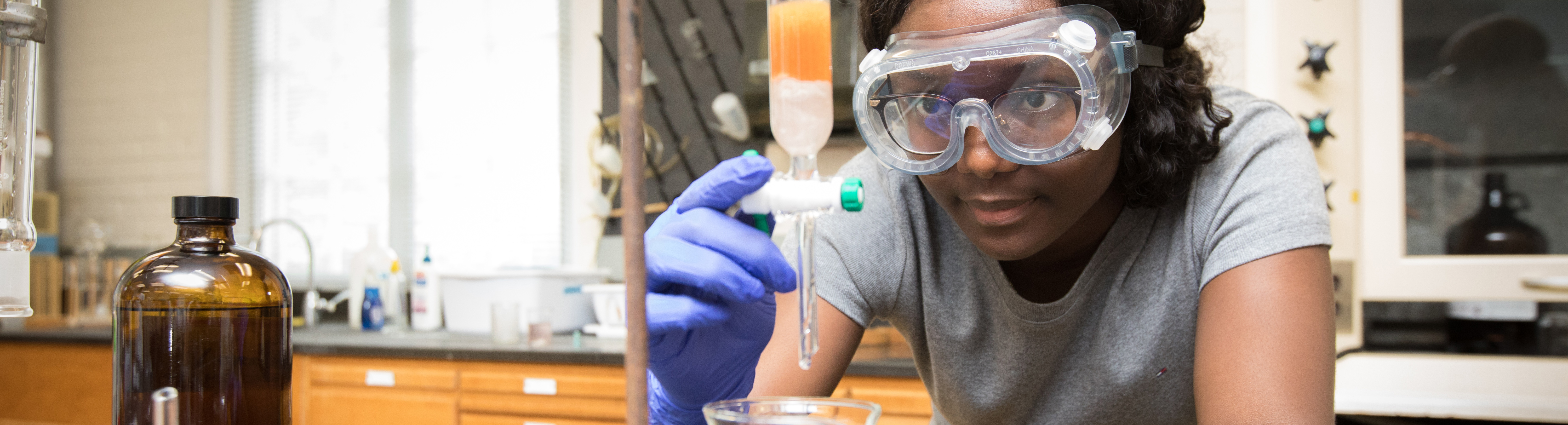 Student doing science experiment