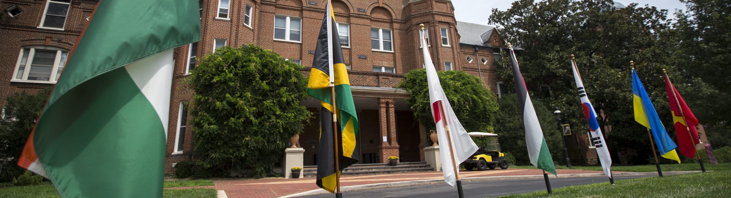 Photo of flags in front of Main Hall