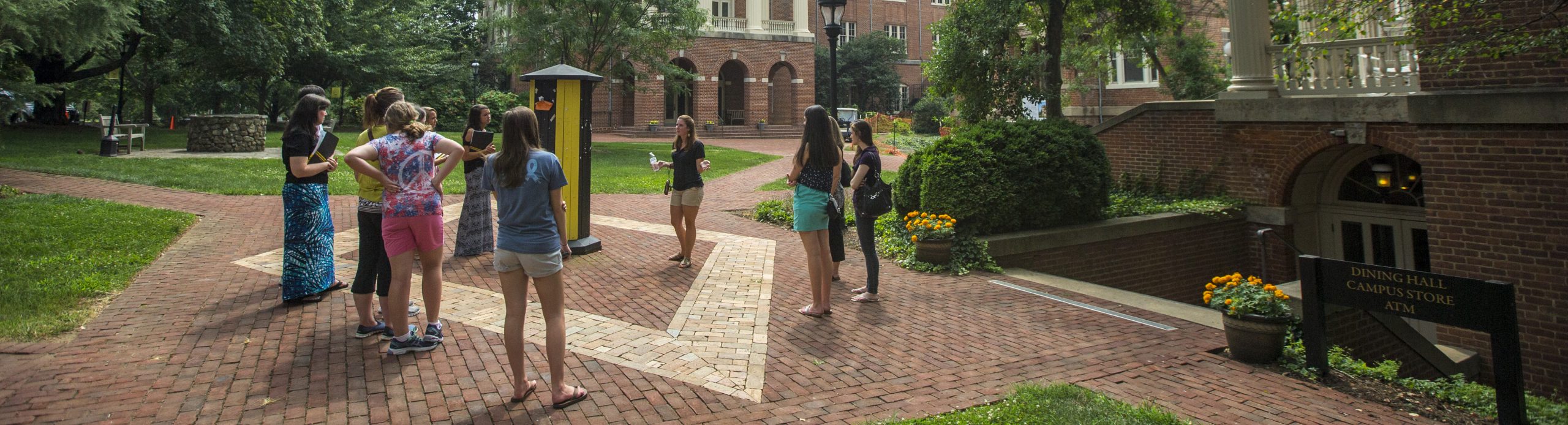 Photo of students talking a tour of campus