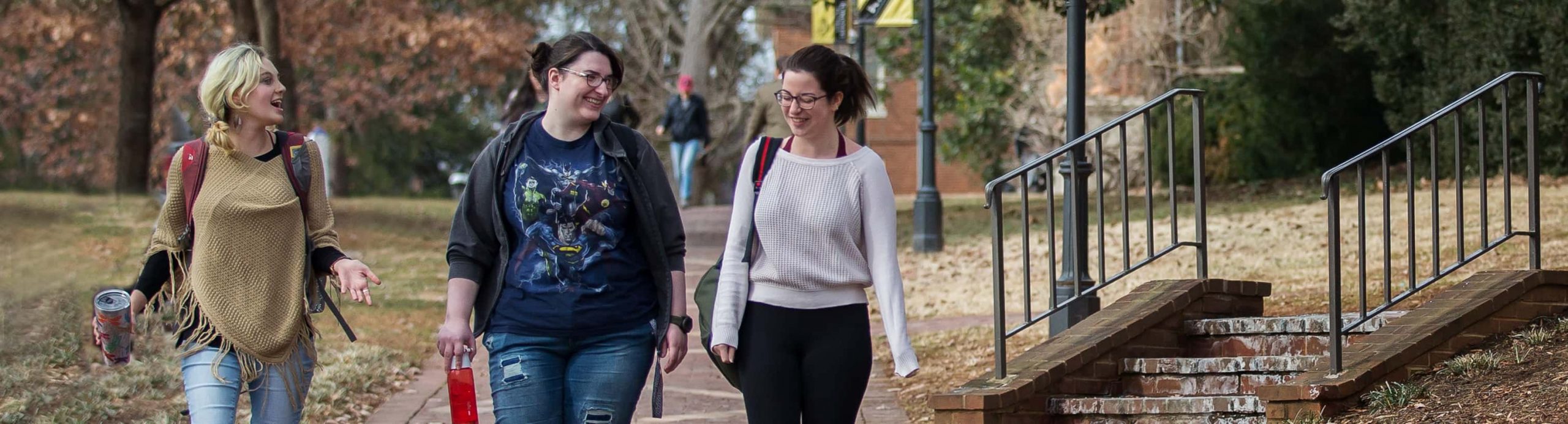 Photo of students walking through campus