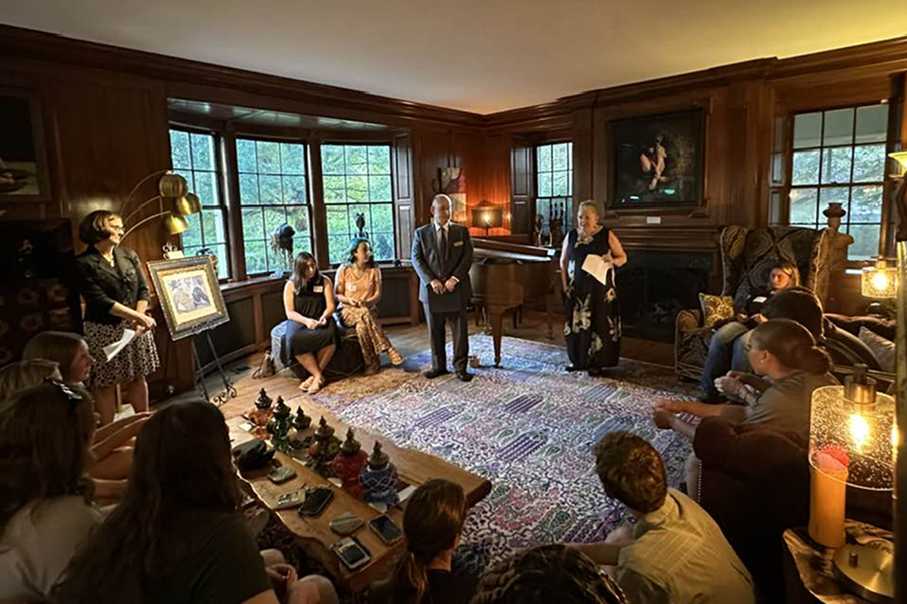 President Sue Ott Rowlands speaks to Honors Scholars in her parlor at Randolph House.