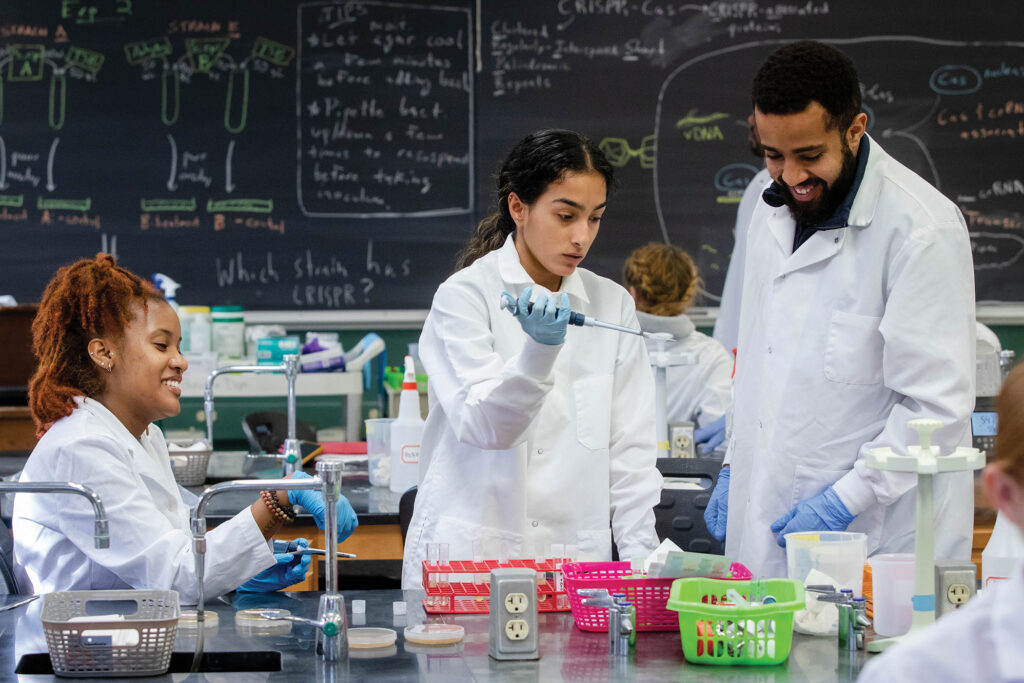 Students test samples in virology class.