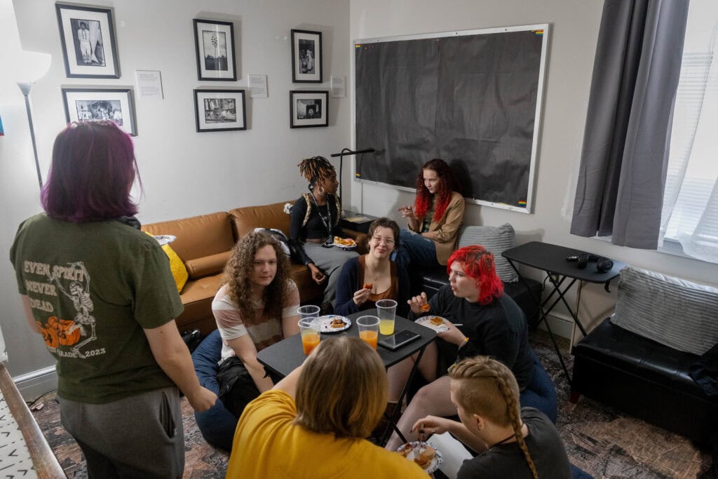 Students, faculty, and staff gather at the Intercultural Center to enjoy treats from a local cafe.