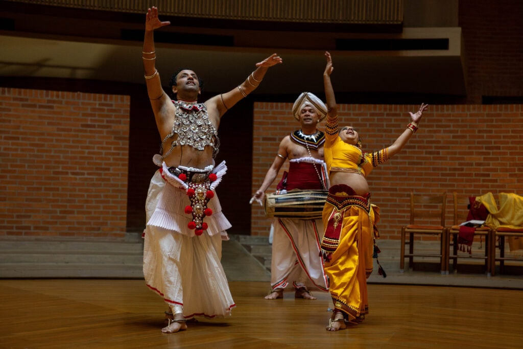 Quillian International Scholar Sudesh Mantillake, Chinthaka Bandara, & Vajira Mantillake perform a traditional Sri Lankan dance.