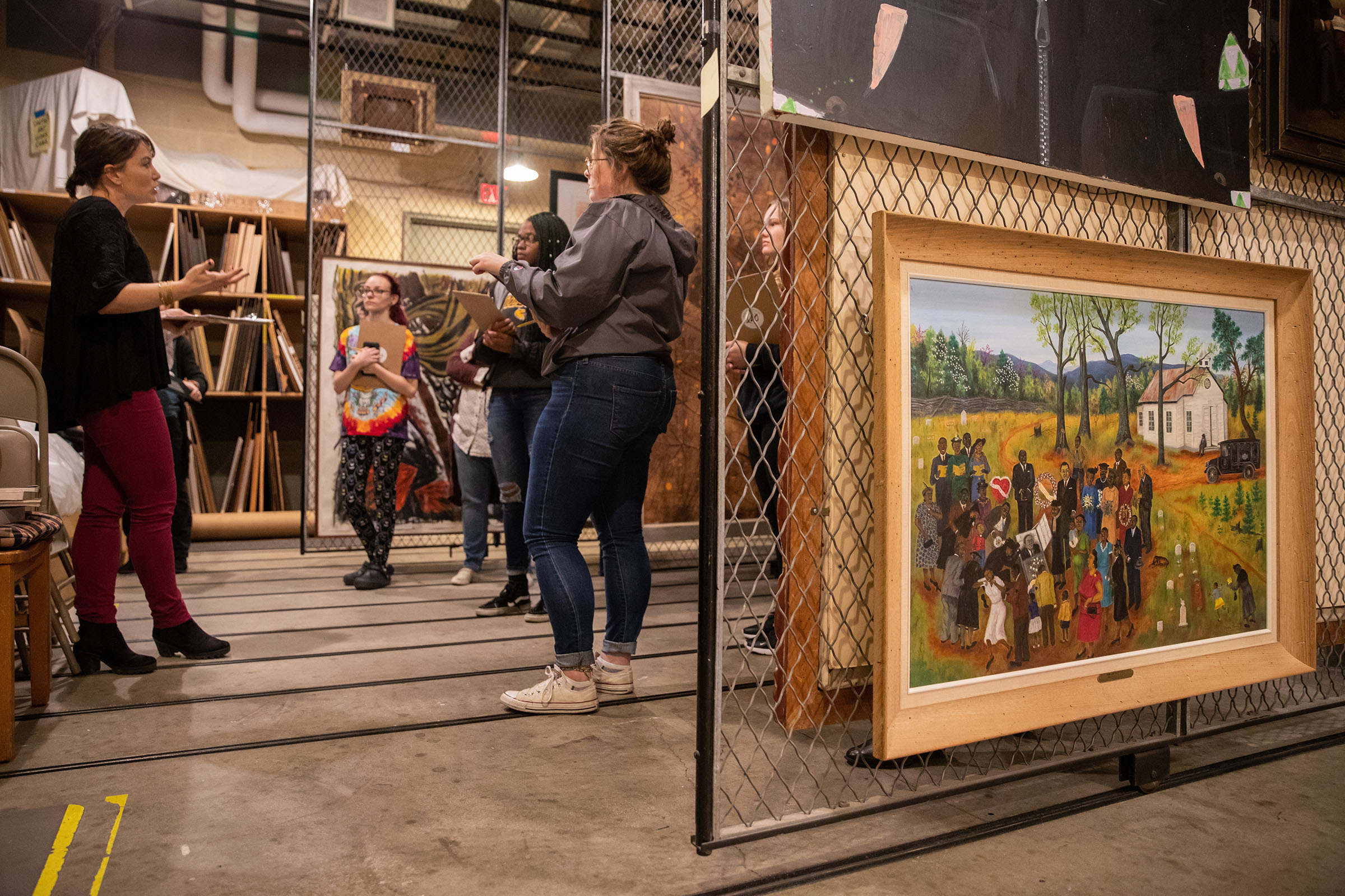 Students in the art vault at the Maier Museum of Art at Randolph College.