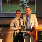 John Grundy ’14 receives the Scholar Athlete of the Year award from Randolph English professor Dan Stiffler. John Grundy ’14 receives the Scholar Athlete of the Year award from Randolph English professor Dan Stiffler.