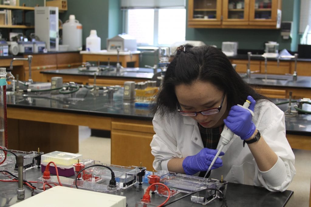 Photo of student in lab