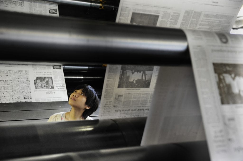 Photo oh Phuong with newspapers Photo oh Phuong with newspapers