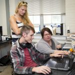 Physics Professor Katrin Schenk (right) assists Eric Huber ‘18 and Franziska Klostermyer '15 with a programming component of their project developing an ultrasonic vocalization research system.