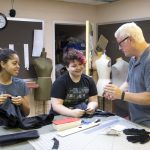 Theatre professor Ken Parks reviews photos of the stage illusion tests with students Morgan Wardlaw ’17 (left) and Daisy Howard ’17.