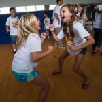 Erin Alburger, 11, (right) acts as part of an exercise in the 