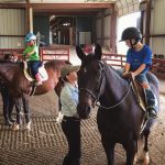 Young riders finish up a week of Pony Camp at the Randolph College Riding Center.