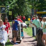 Photo of students and parents moving in.