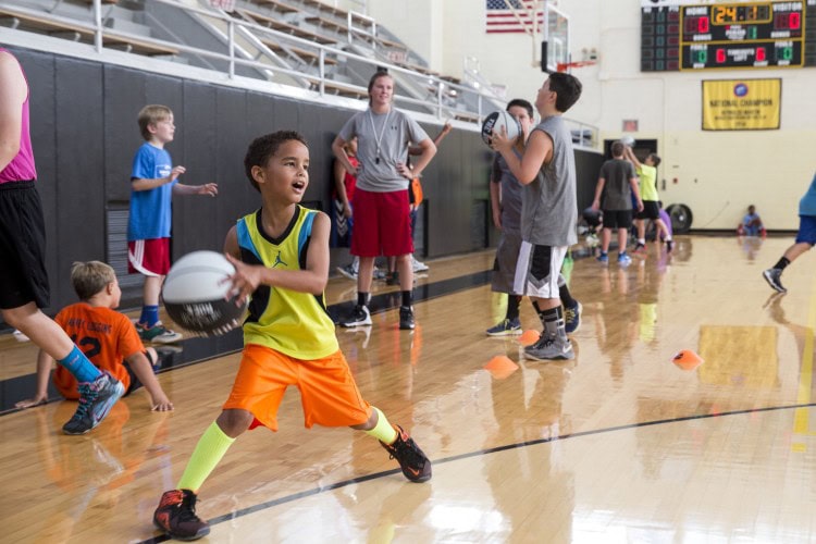 A camper prepares to pass the ball at Randolph's Skill Builder Hoop Camp 2015. A camper prepares to pass the ball at Randolph's Skill Builder Hoop Camp 2015.