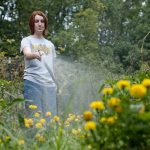 Girl watering flowers